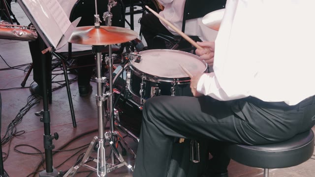 Man Playing The Drums