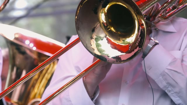 Man Playing On Trombone