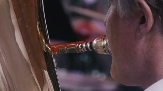 Man Playing On Trombone