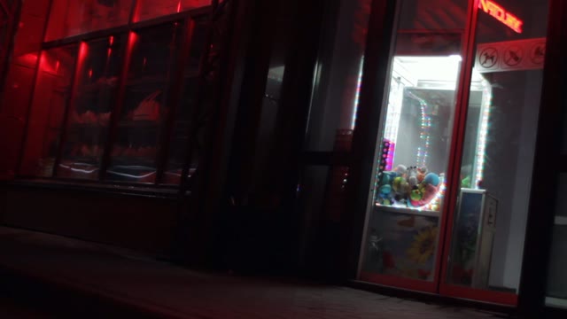 Shop In The Night. Blink Advertising Signboards