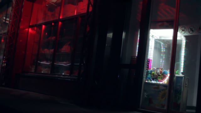 Scary Store At Night. Blink Advertising Signboards