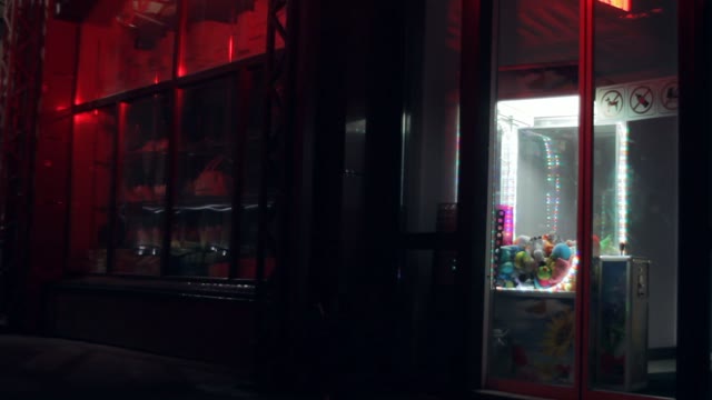 Scary Store At Night. Blink Advertising Signboards