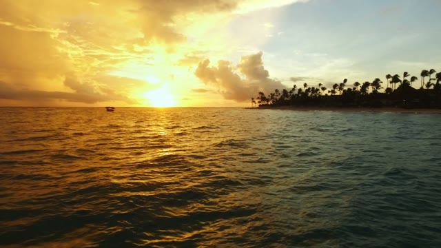 The Camera Flies Over The Sea Along The Coast