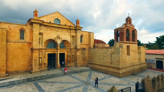 The Camera Flies Over A Small Catholic Church