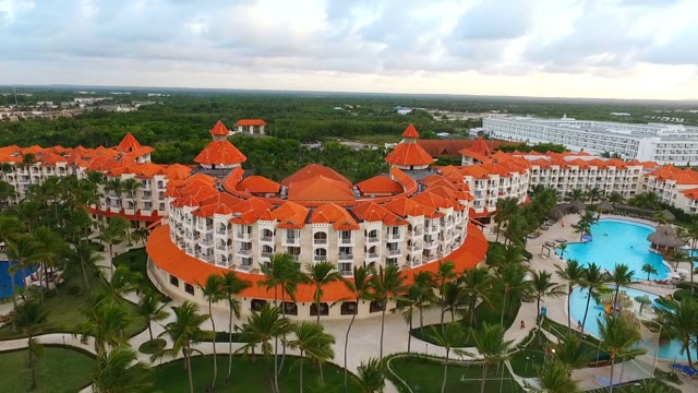 Drone Flies Along A Large Hotel