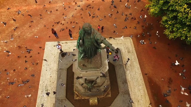 The Camera Flies Around The Bronze Statue