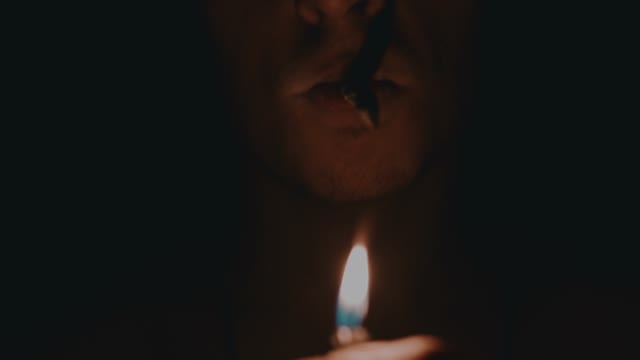 Man In The Dark With Cigarette Close-up
