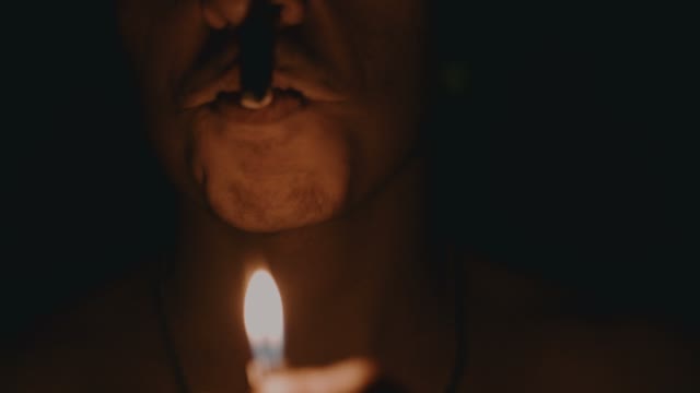 Man In The Dark With Cigarette Close-up