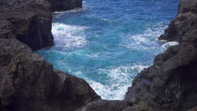 Waves Beating Against The Stone Beach
