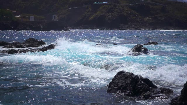 Big Waves Beating Against The Stone Beach