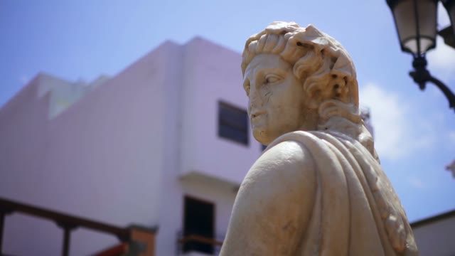 Beautiful Statue In The Background Of The City