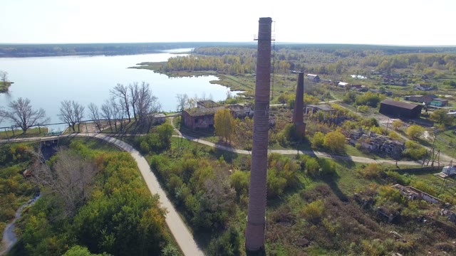 Destroyed Buildings Near The Lake. Aerial Shooting