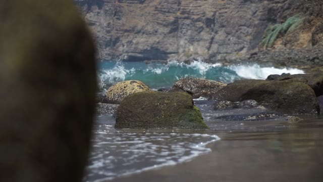Rocky Seashore Washed By The Waves