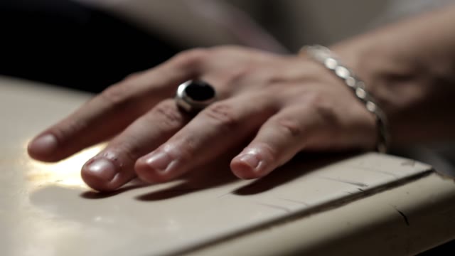 Male Hand On The Table Close-up