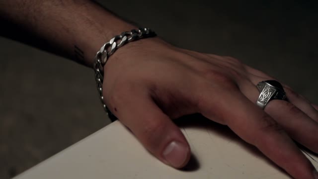 Male Hand On The Table Close-up
