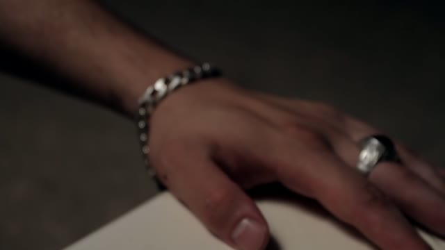Male Hand On The Table Close-up