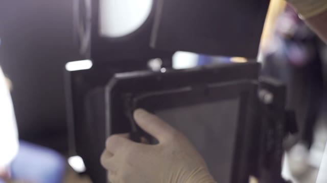 Men Prepare The Camera To Shoot Close-up