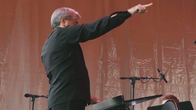 Conductor Controls The Orchestra