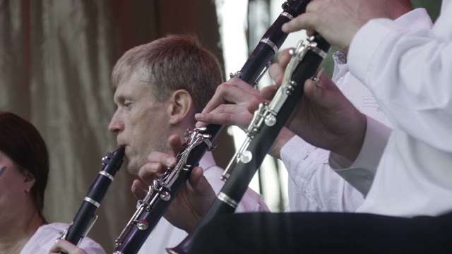 Men Play The Flute