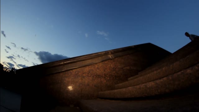 The Guy On The Skateboard Slides On The Brink At Sunset