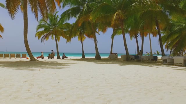 Paradise Coast On The Island With White Sandy Beach, And Massage Tables By The