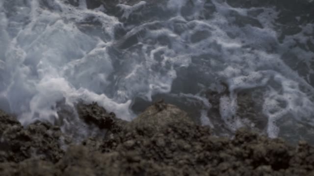 Water Hits The Rocky Shore