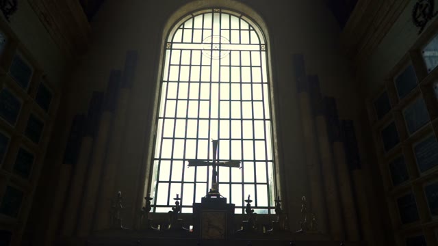 Large Cross Against The Window