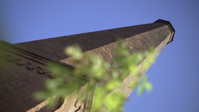 Man Photographs Chimney On The Retro Camera Close-up