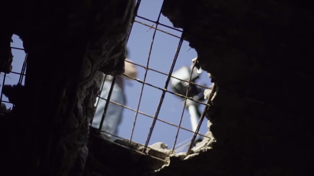 Surveillance Of Photographer Through A Hole In The Floor