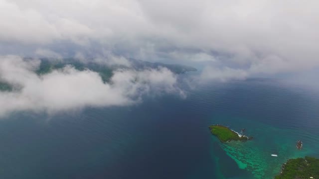 View From Quadrocopters Among The Clouds In The Ocean