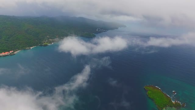 View From The Drone On The Blue Water And Green Mountains
