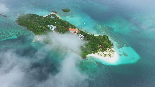 A Small Island In The Middle Of The Ocean A Little Rain