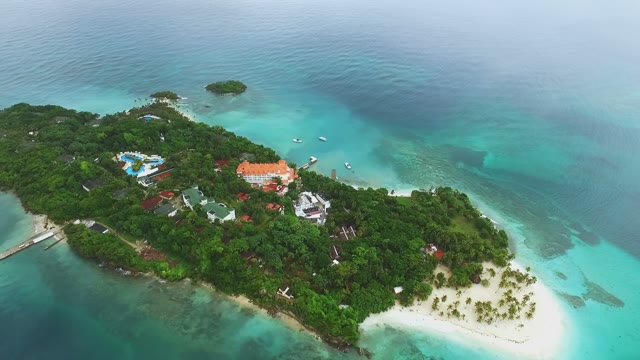 Aerial View Of The Divine Island With Beach In The Middle Of The Ocean