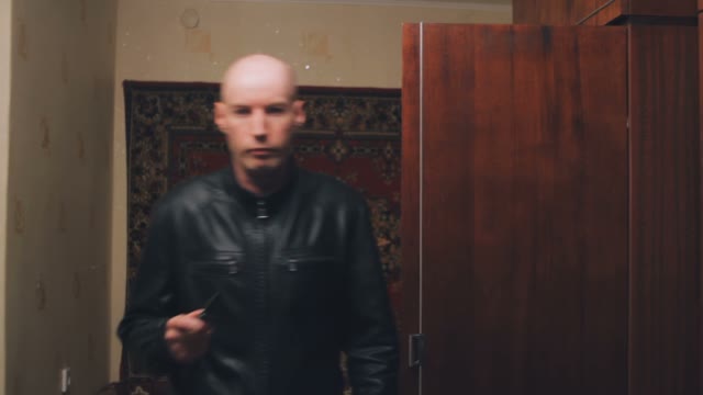 Shooting Scene Bald Man With A Knife