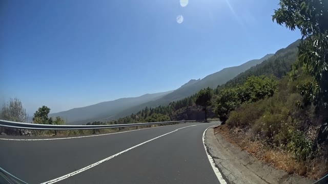 Fast Car On A Mountain Road In The Daylight, Window View