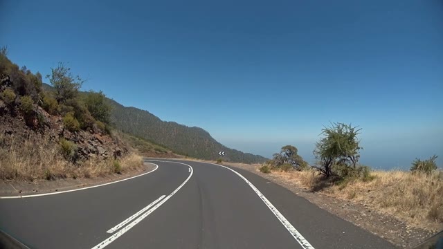 Car Going Fast Mountain Road