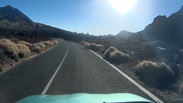 Car Is On The Mountain Road Moving Fast