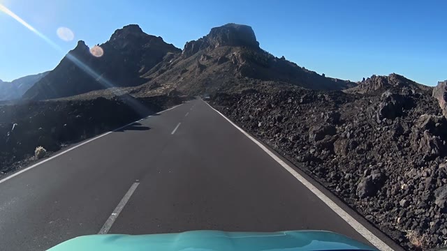 Front View From A Moving Car Going Strait To Mountain