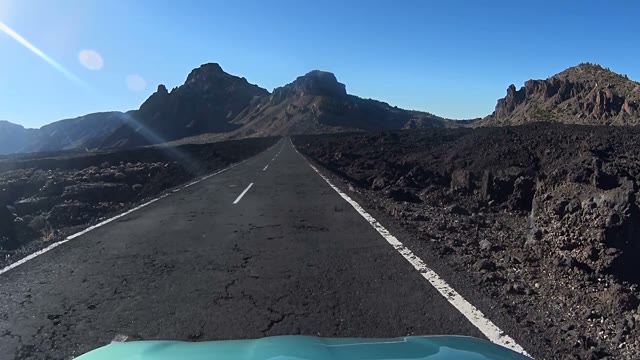 Front View From A Car Going Down A Road
