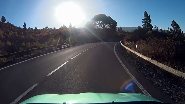 Car Going Down Mountain Road