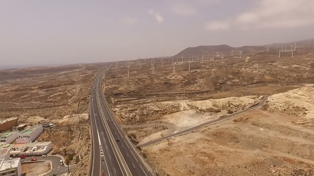Lots Of Windmills In The Valley Near The Highway