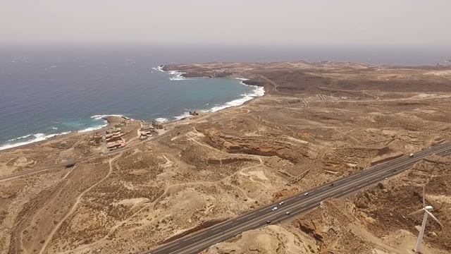 Drone Shot Of A Valley Full Of Windmills