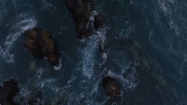 Ocean Waves Hitting Rocks