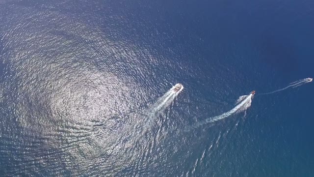 Drone Filming Ships In Open Sea, Aerial View