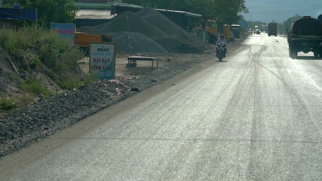 People Riding Mopeds