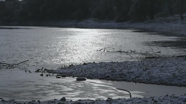 The River In The Sun Begins To Freeze