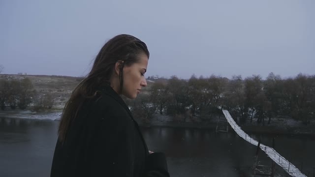Beautiful Sad Woman Posing On A Background Of The River