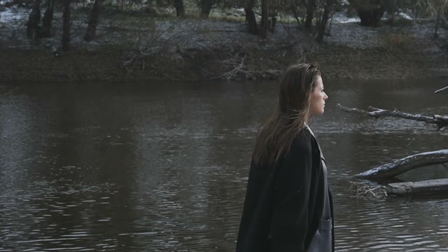 The Beautiful Girl Walking Near River