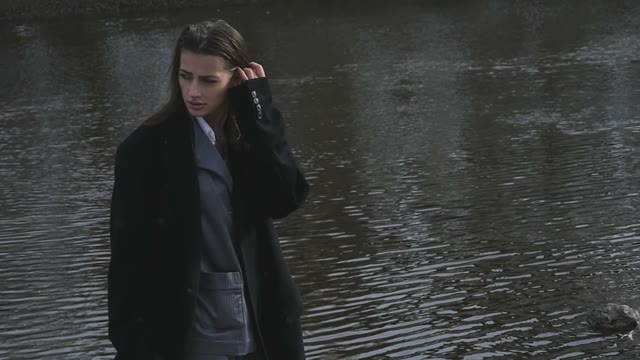 The Girl At The River In The Evening In The Dark Light