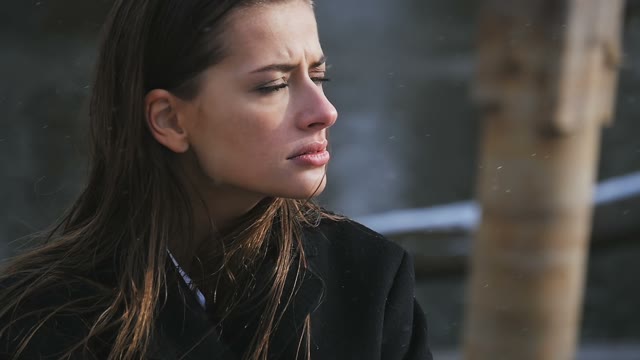 Portrait Of A Beautiful Girl In The Autumn Snow